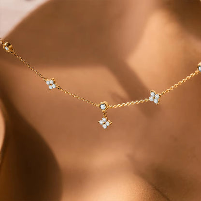 E-Manco Luxury Stainless Steel Gold Necklace for Women featuring Minimalist Four-Leaf Clover Design with Zircon Accents
