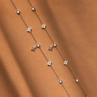 E-Manco Luxury Stainless Steel Gold Necklace for Women featuring Minimalist Four-Leaf Clover Design with Zircon Accents