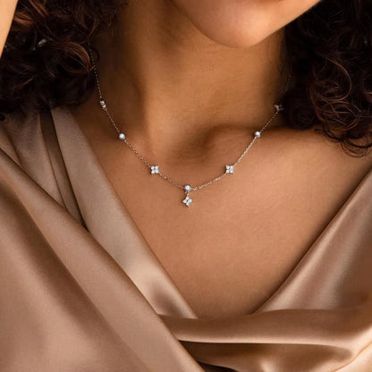 E-Manco Luxury Stainless Steel Gold Necklace for Women featuring Minimalist Four-Leaf Clover Design with Zircon Accents